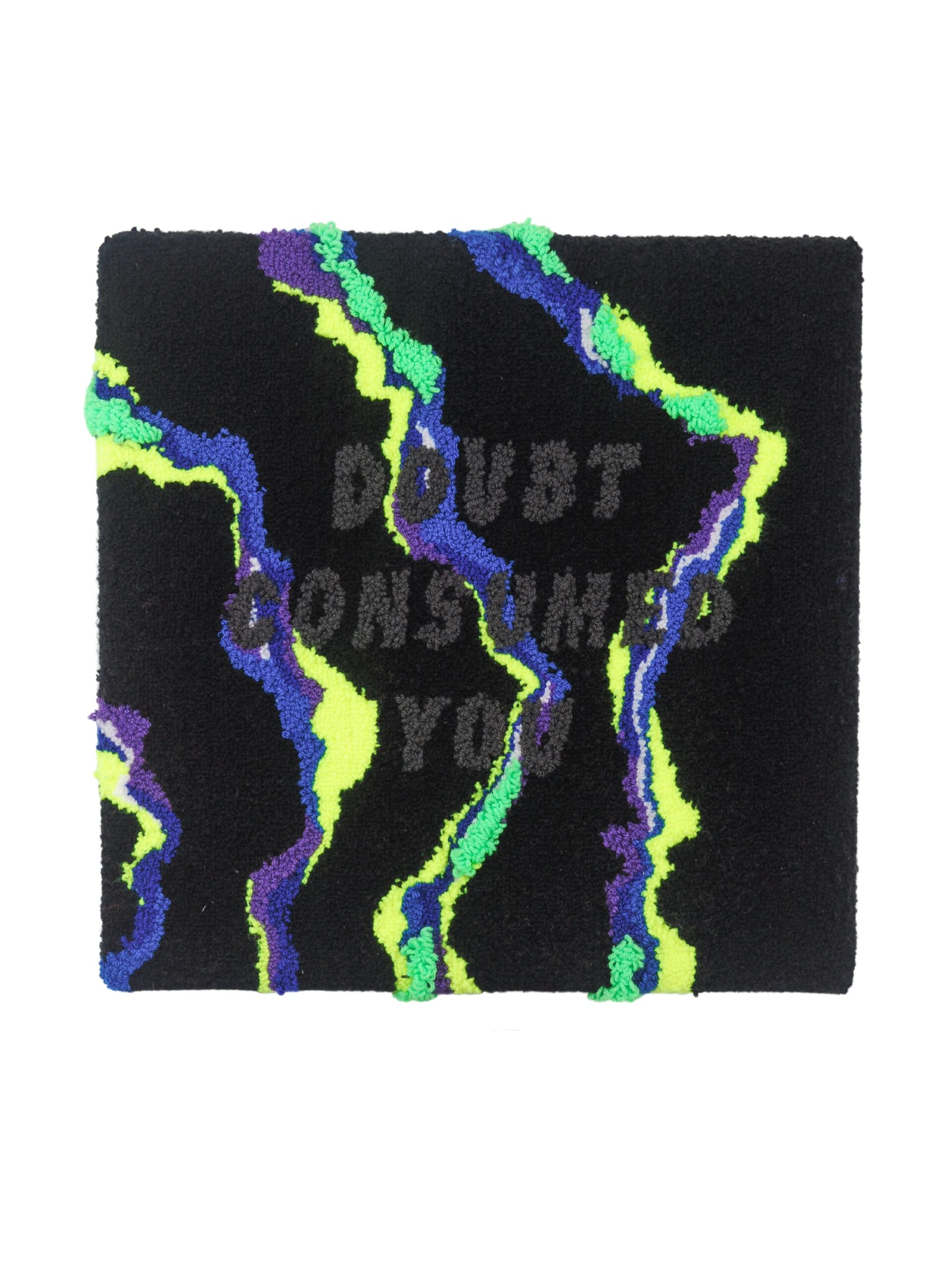 Fabric glued together in neon green, blue, yellow, and black with text