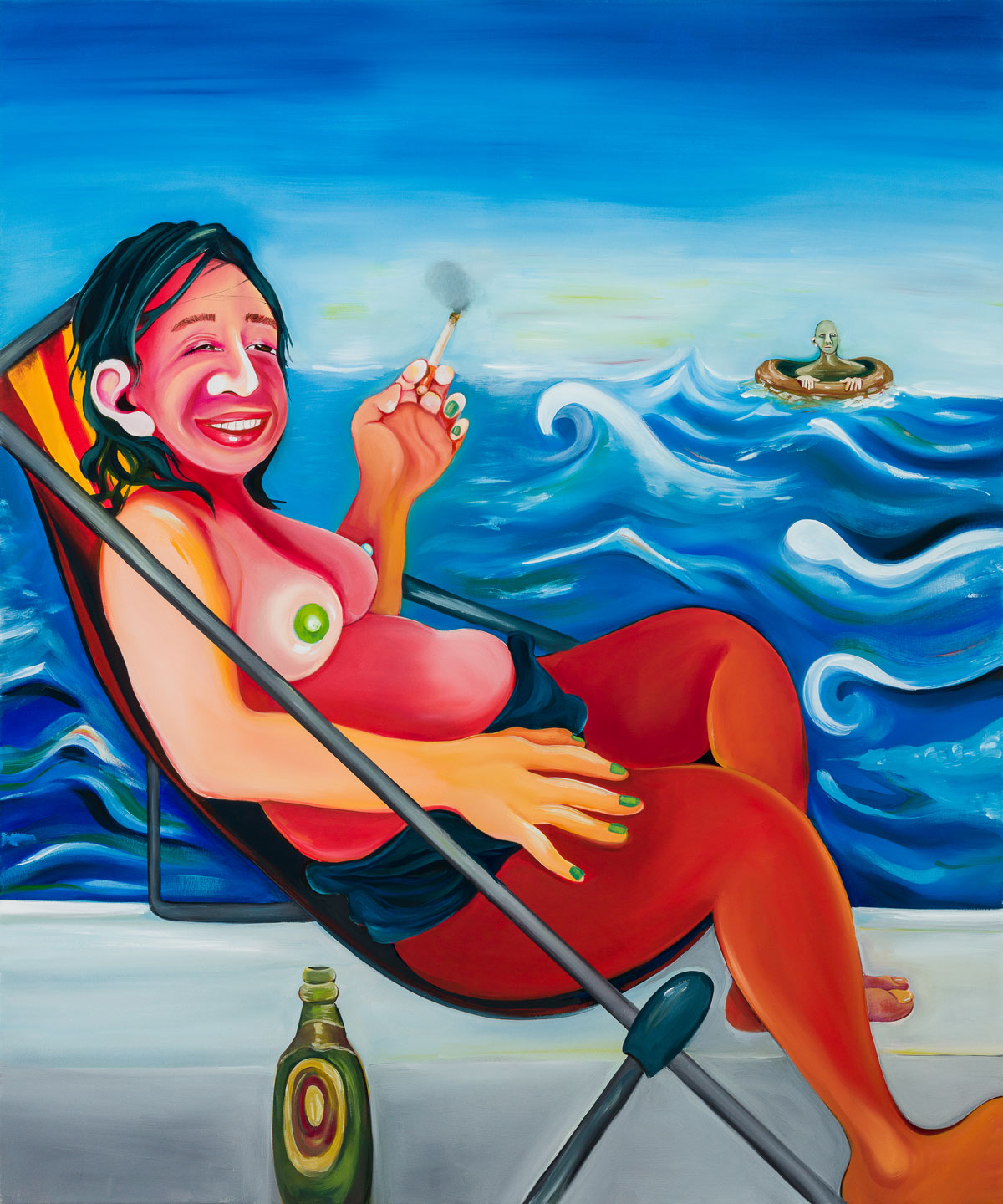 Woman sunbathing by the ocean