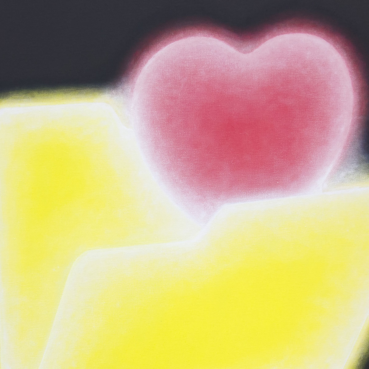 Yellow folder with red heart peeking out against black background