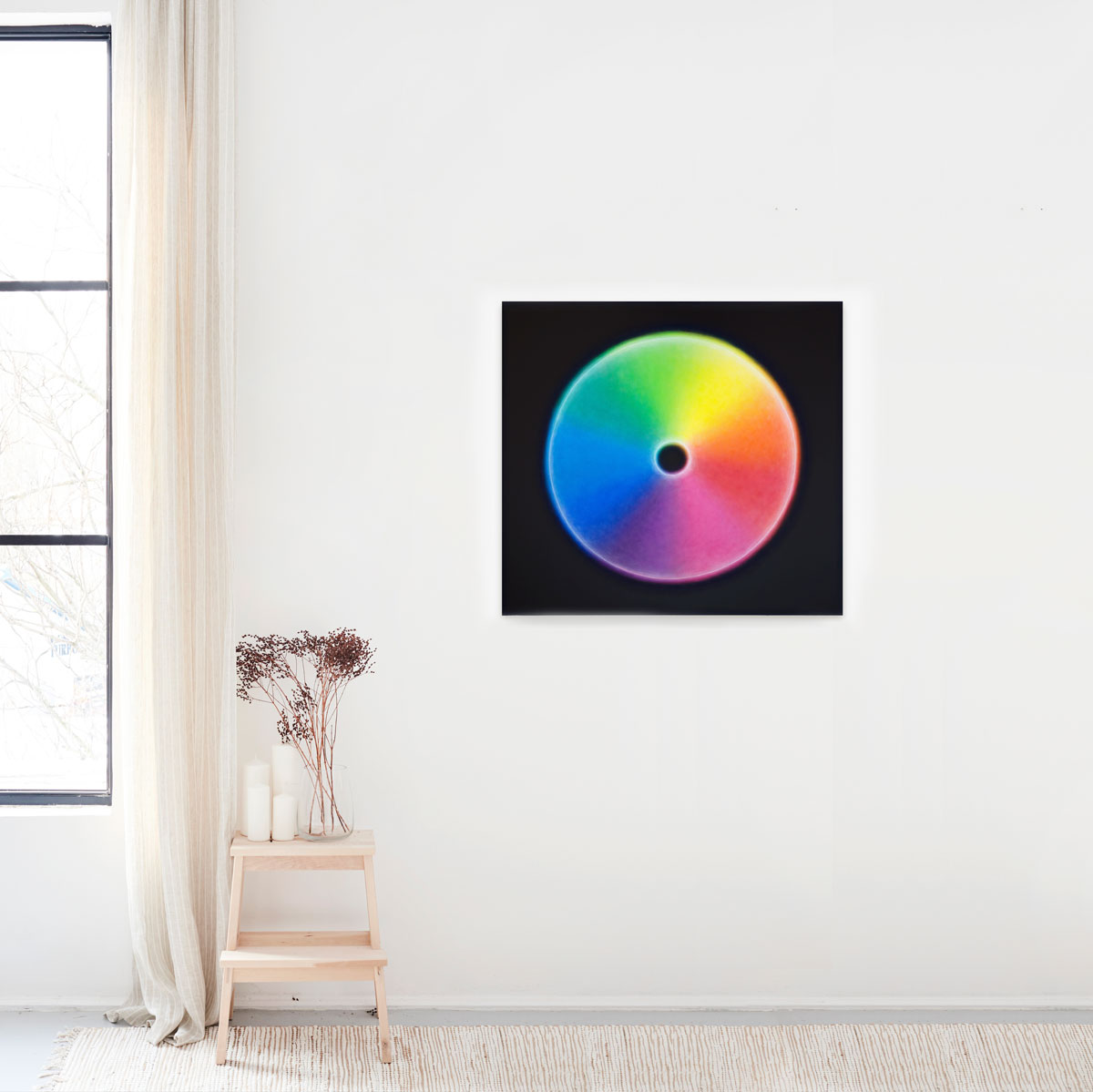 A rainbow color wheel against a black background
