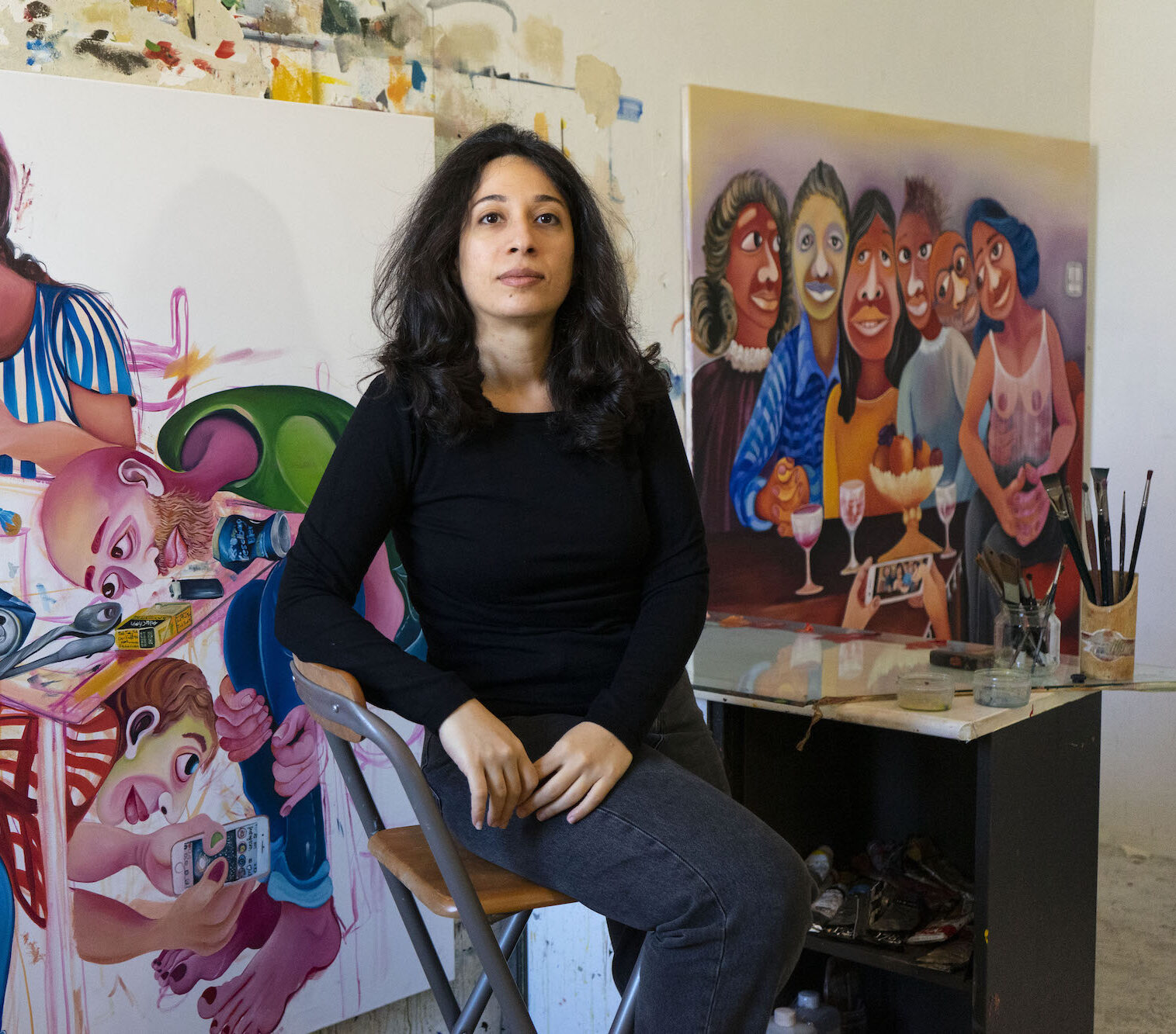 Photo of female artist in studio